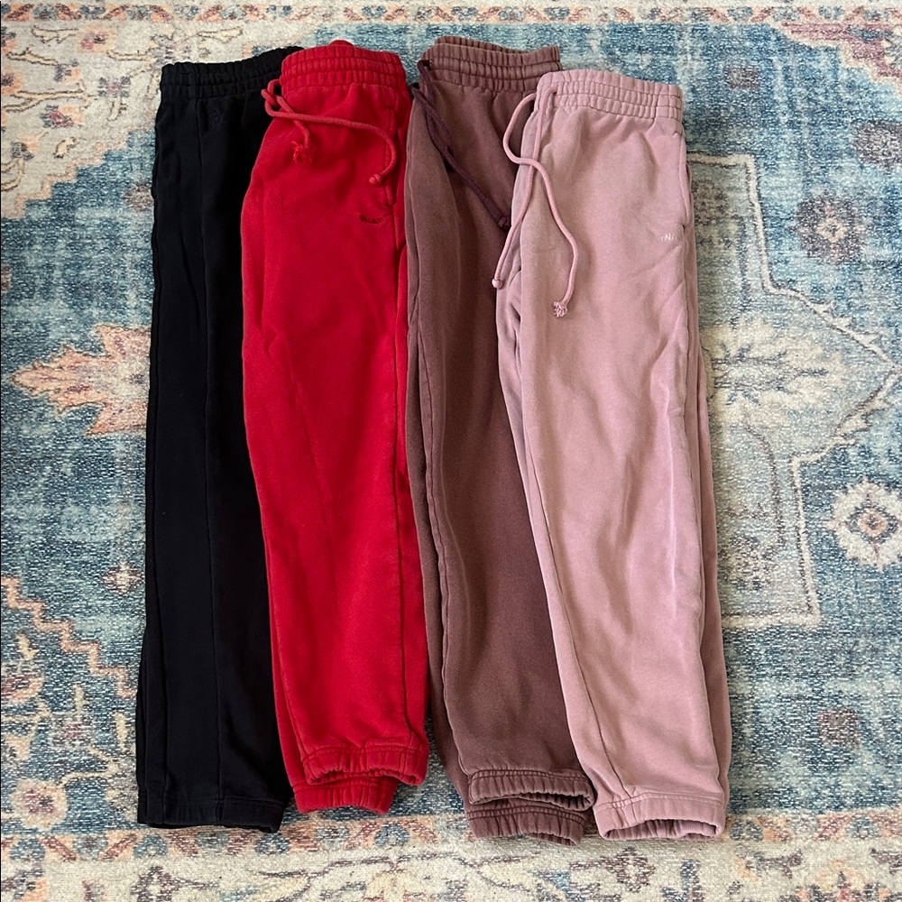 3 pairs of TNA Sweatpants (black pair-SOLD)